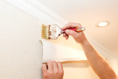 Pose de papier peint à Charézier — revêtements muraux et toiles de verre